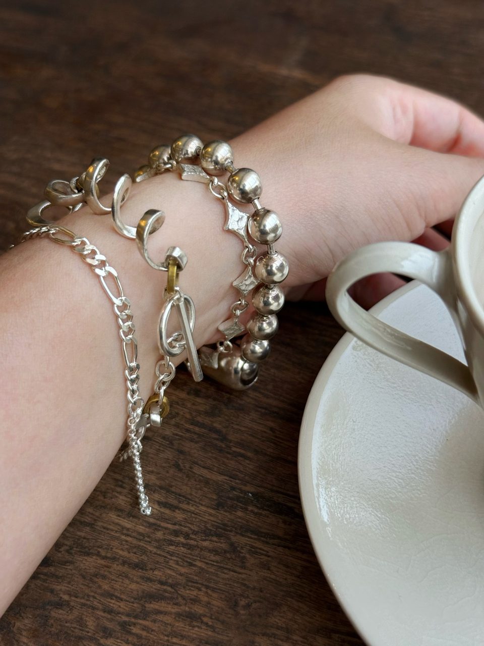 Le Fond Lava Star bracelet, 925 silver with crystal, worn with other pieces (3)
