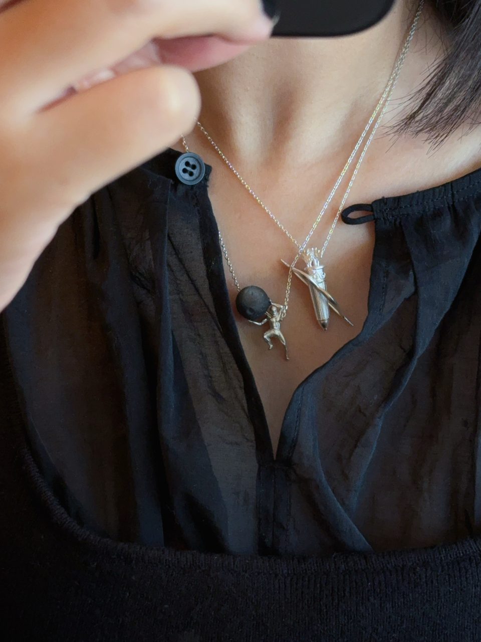 Le Fond Artemis’ Quiver pendant, 925 silver, worn with other pieces (4)